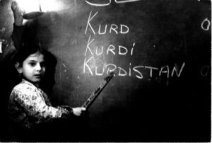 kurdish-girl-black-board